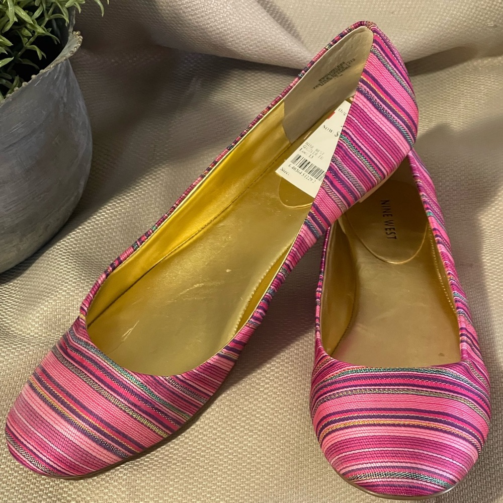 Ladies Nine West pink striped  flats. Size 11.